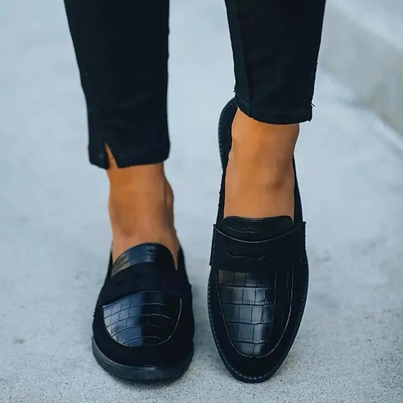 Women's black flat round toe penny loafers